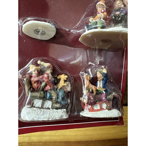 St Nicholas Square Village Collection ice skating figures Set Of 4 Dog Sledding - Picture 3 of 3